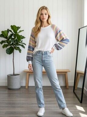 This Free People Rainbow Dreams pullover knit top features thermal knit fabric.